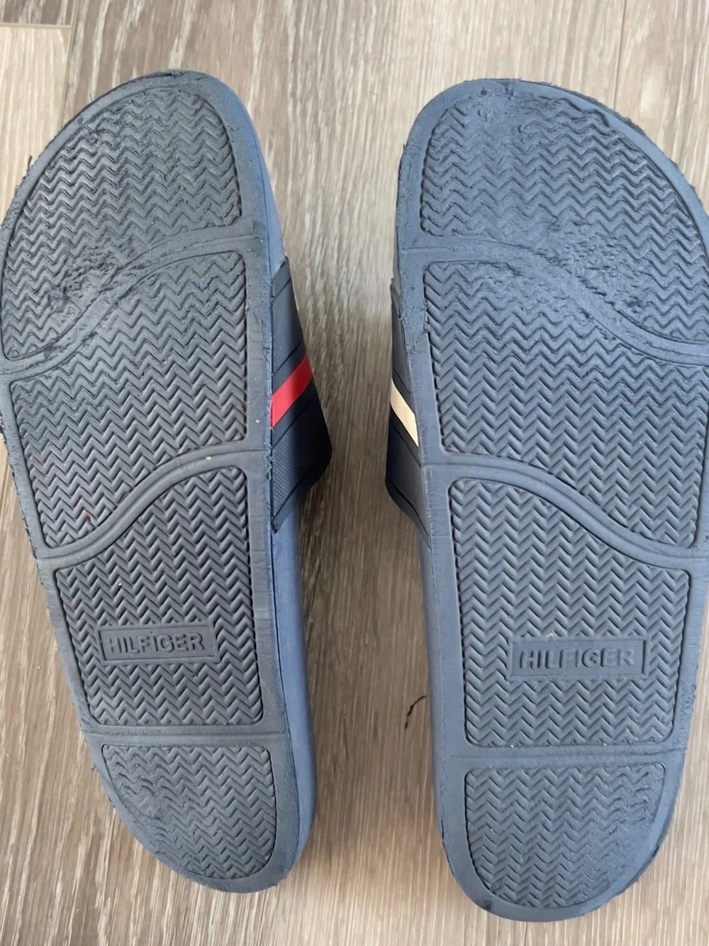 Tommy Hilfiger Navy Slides with Red It doesn't have a number but it's like a 10